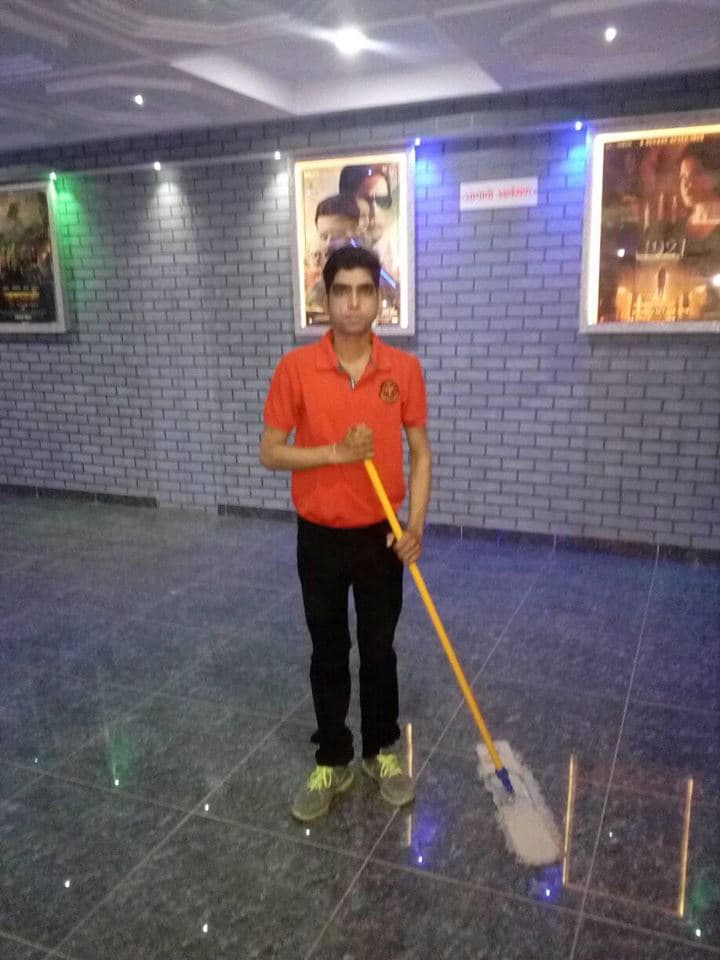 Housekeeping Staff with Microfiber Floor Mop